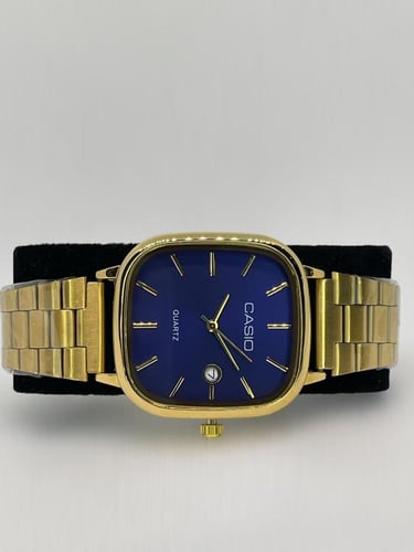 ساعة كاسيو رجالي اطار ذهبي ميناء أزرق