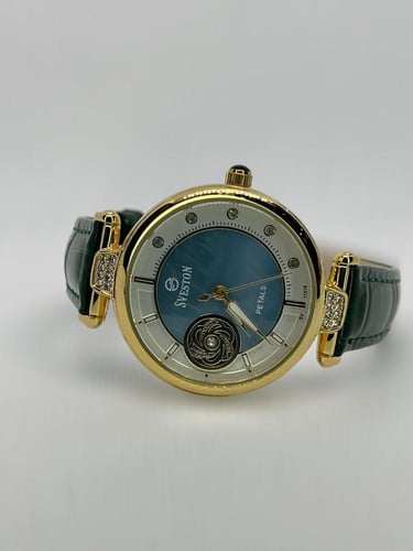 ساعة سيفيستون النسائية ميناء ذهبي و سوار جلد أخضر