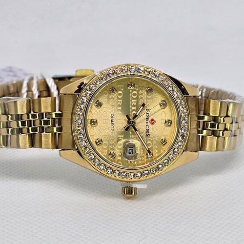 ساعة نسائية ميناء دائري ذهبي مفصص و سوار ذهبي