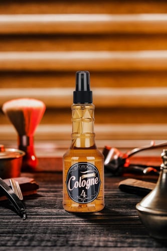 كولونيا رجالية بعد الحلاقه بلون ذهبي NO4 من توتكس...