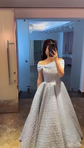 فستان سهرة سماوي كلفه الاصلي دبل كلوش