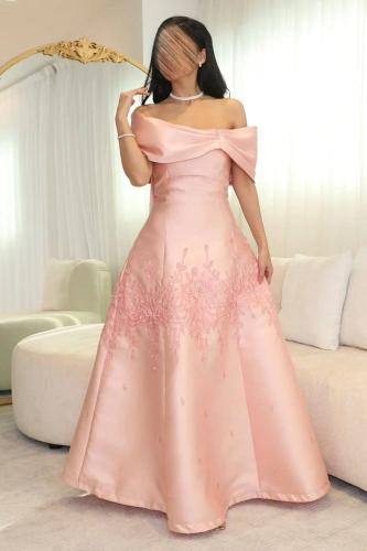 فستان سهرة بتصميم فيونكة