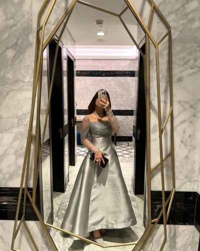 فستان سهرة انيق باكمام شفافة