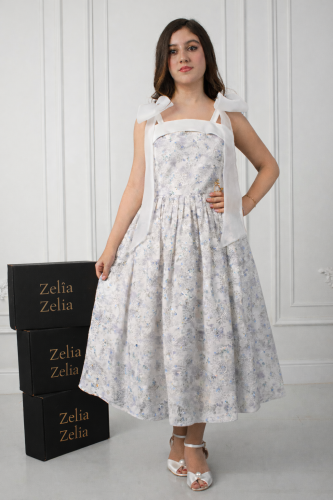 Luxury midi dress with delicate embroidery and an elegant feminine touch