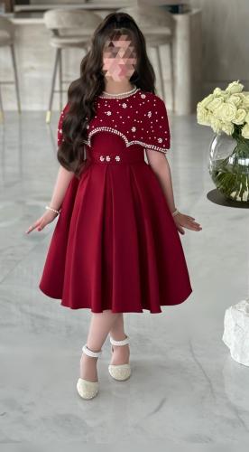 Luxury red girls' dress with elegant pearl details