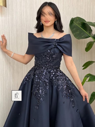 فستان سهرة راقي مدجج كحلي