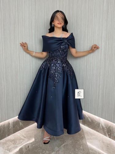 فستان سهرة راقي مدجج كحلي