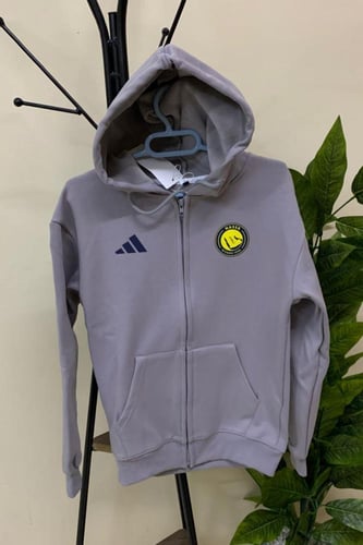 جاكيت شتوي رمادي نادي النصر 2026 تصميم رسمي بسحاب...