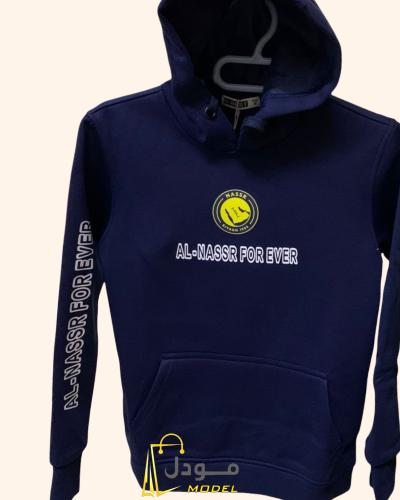بلوفر شتوي نادي النصر الكحلي 2026 بغطاء رأس رياضي...