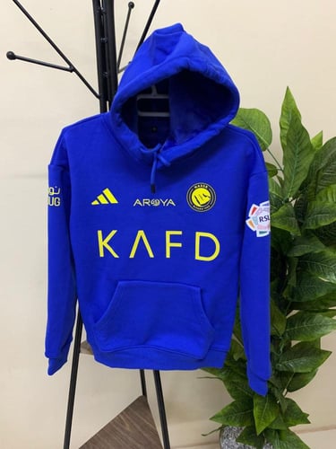 طقم شتوي نادي النصر 2026 بلوفر أزرق وسروال أسود با...