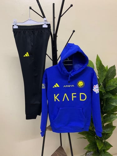 طقم شتوي نادي النصر 2026 بلوفر أزرق وسروال أسود با...