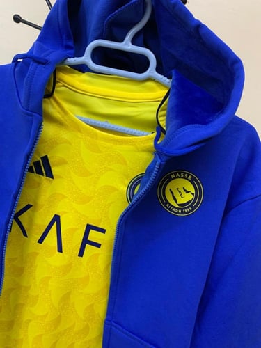 طقم شتوي ولادي نادي النصر 2026 جاكت ازرق وتيشيرت ا...