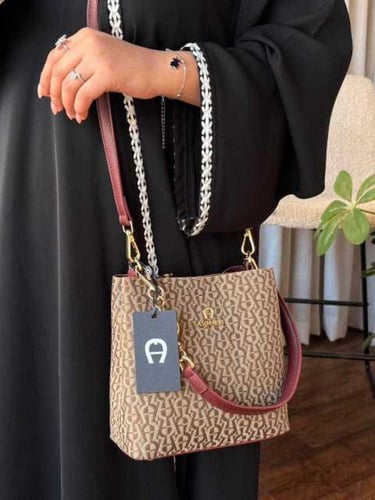 شنطة أجنر نسائية فاخرة مع ملحقات