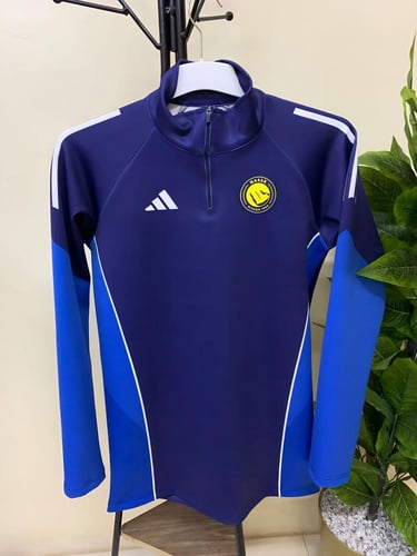 طقم سويتر تمارين نادي النصر الشتوي الكحلي 2026 تصم...