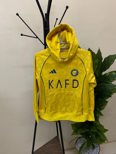 بلوفر شتوي نادي النصر الاساسي الذهبي 2026 بلوفر ال...