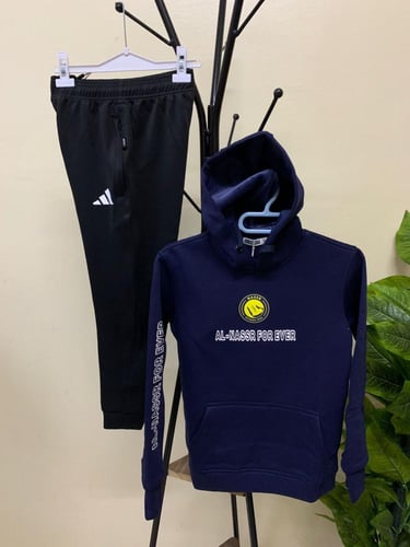 بلوفر شتوي نادي النصر الكحلي 2026 بغطاء رأس رياضي...