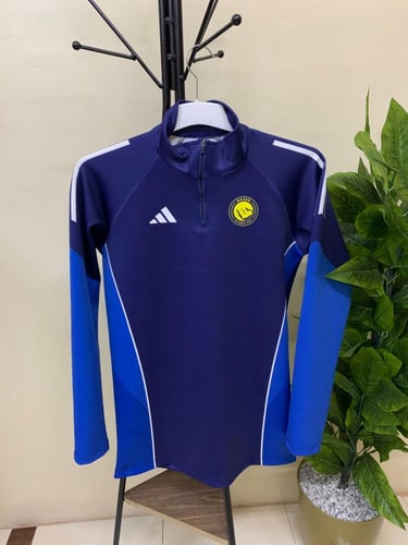 سويتر تمارين نادي النصر الكحلي الجديد 2026 بفتحة إ...