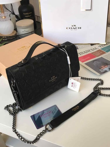 حقيبة كوتش أصلية بتصميم أنيق ومقبض علوي