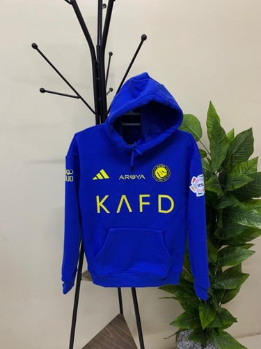 بلوفر شتوي نادي النصر الازرق الرسمي 2026 بجيوب وغط...