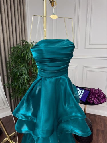 فستان سهرة اورجنزا لمعة