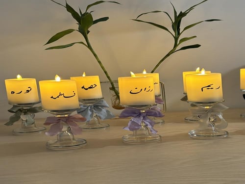 شمعة مع شمعدان