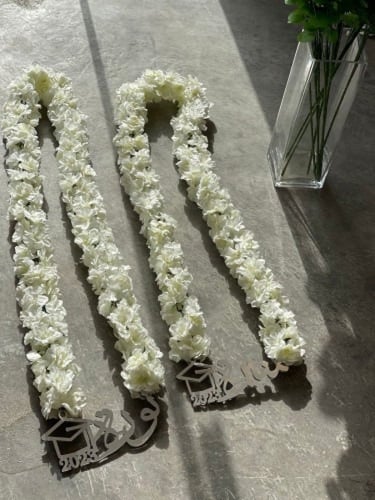 عقد من الورد ترخرج بالاسم