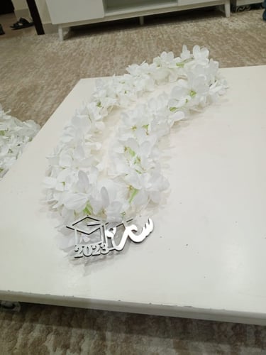 عقد من الورد ترخرج بالاسم