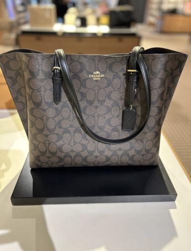 شنطة coach