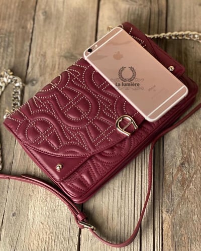 شنطة aigner