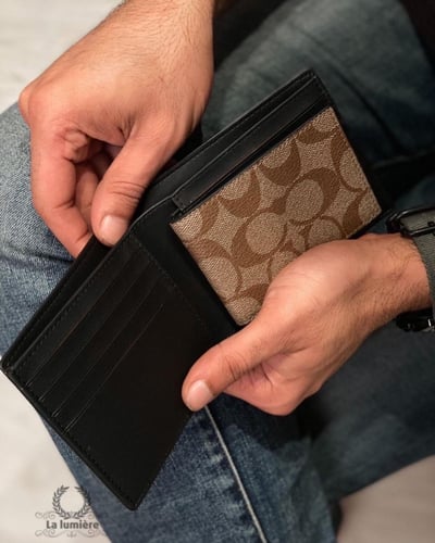 محفظة coach