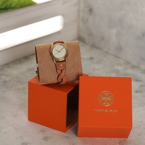 ساعة tory burch
