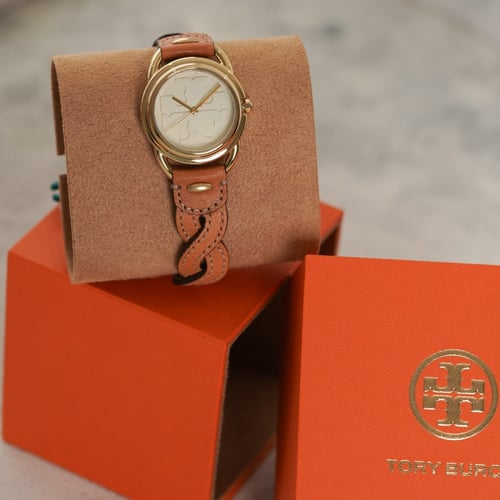 ساعة tory burch