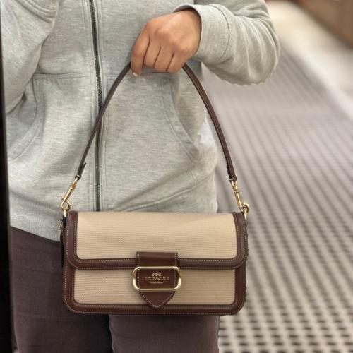 شنطة coach