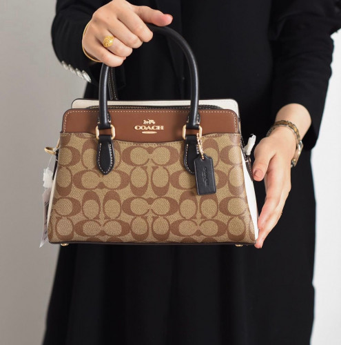 شنطة coach
