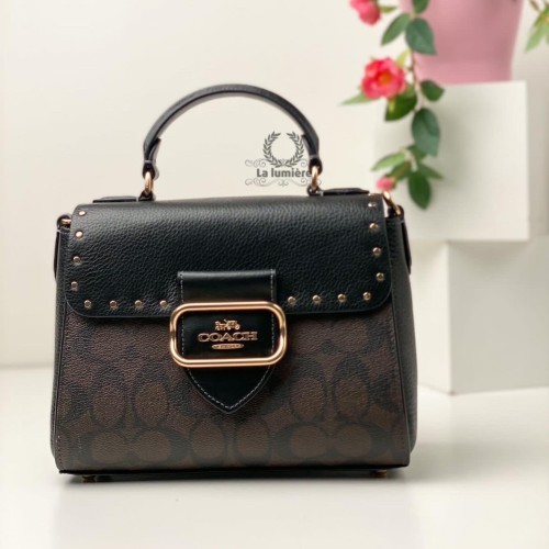 شنطة coach