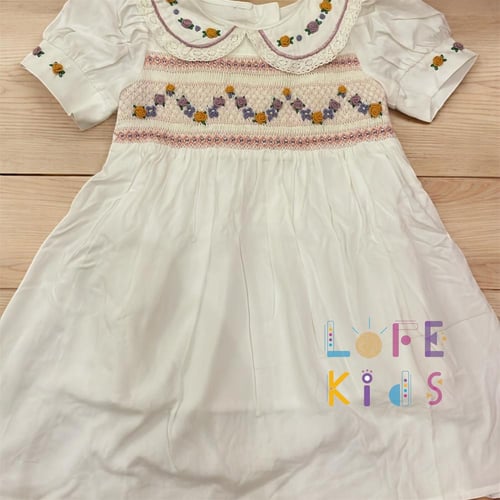 فستان بتطريز موف