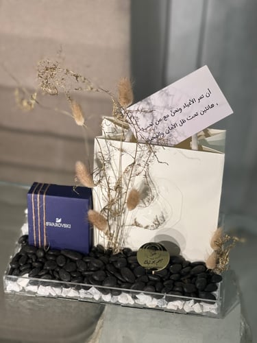 هدية ( حلق سوارفسكي اصلي مع تنسيق )