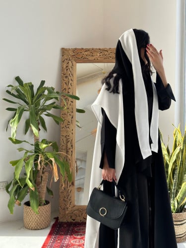 Black abaya and white scarf