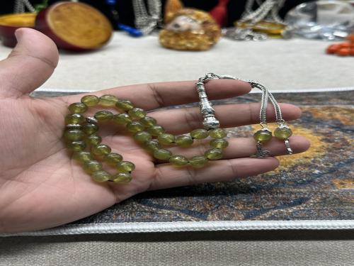 زبرجد افريقي طبيعي ٣٣ خرزه ٧ ونص مل ٣٢ جرام