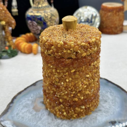 تحفه على شكل ابريق مغطا بالكهرمان بالكامل الطبيعي...