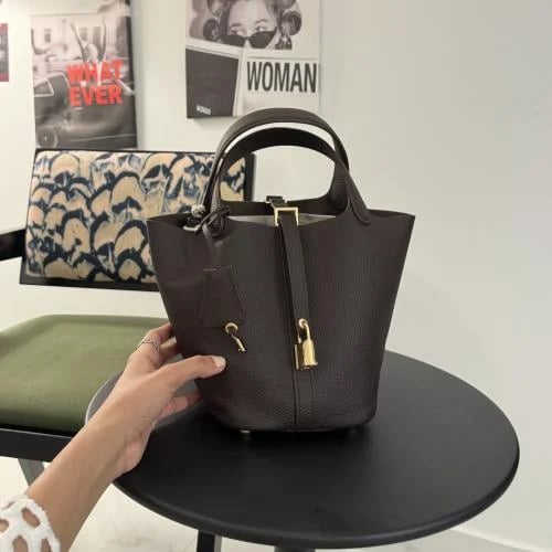 Large brown picottan with a gold lock
