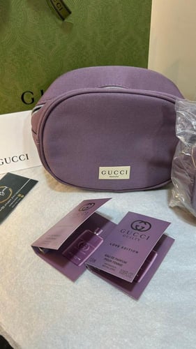 حقيبه قوتشي البنفسجيه