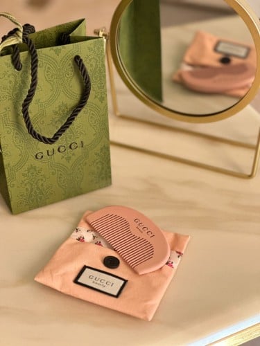 توزيعات مشط قوتشي الخشبي