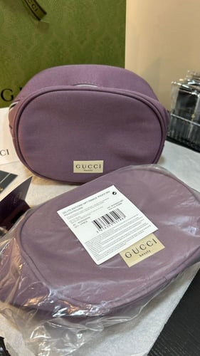 حقيبه قوتشي البنفسجيه