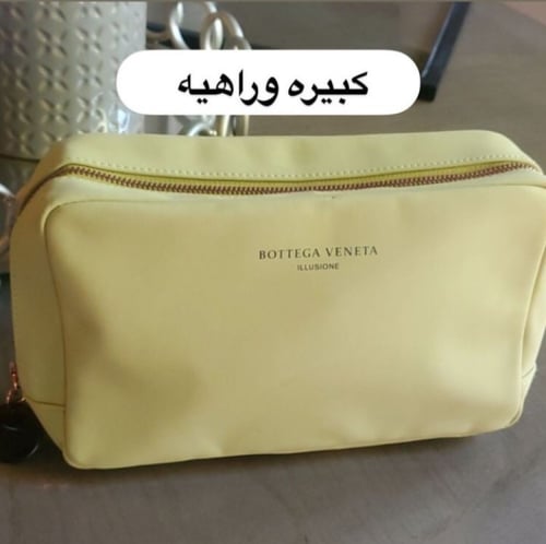 حقيبة بوتيقا مع عينة عطرية