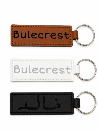 Leather keychain medal with engraving of the name