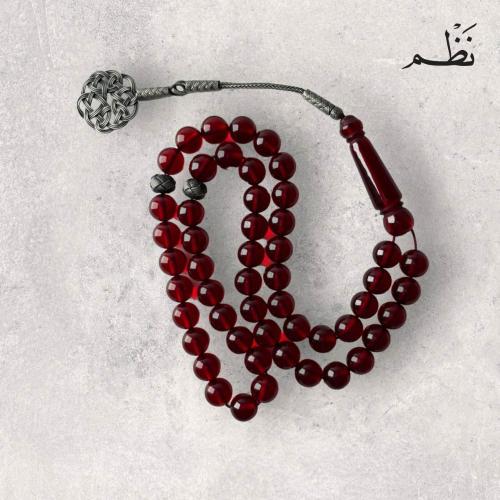 مسباح بكلايت أحمر شفاف