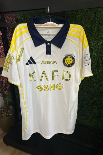 تيشيرت نادي النصر الابيض الجديد 2025-2026