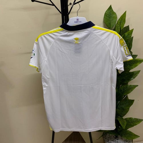 تيشيرت نادي النصر الابيض الجديد 2025-2026