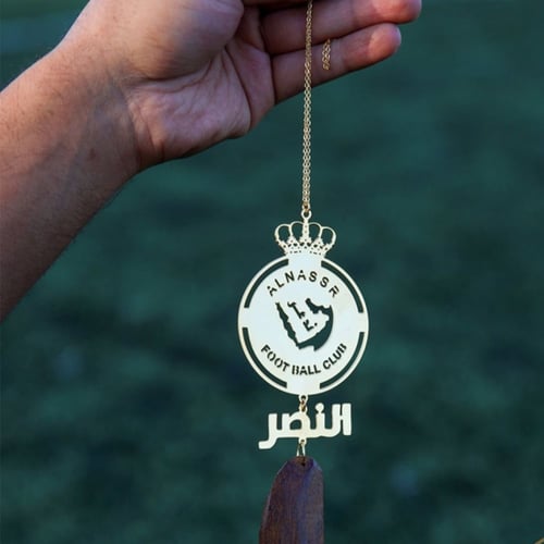 تعليقه سياره مزينه بشعار نادي النصر